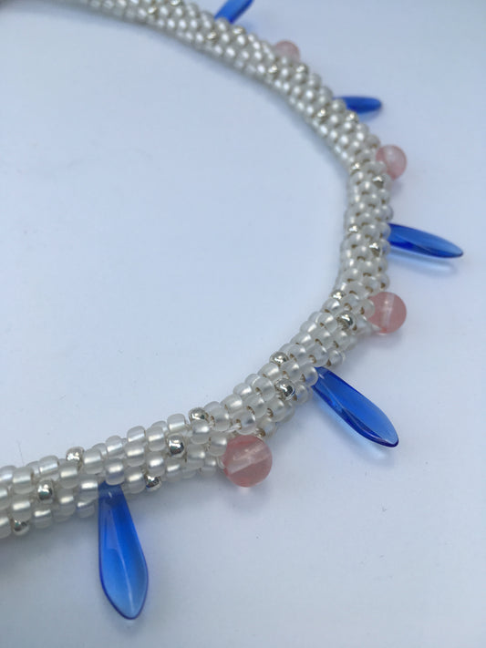 Rose beads with Blue daggers